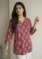 Ruhi short kurti with a traditional rust-red floral print and an adjustable wrap-around silhouette – Kalyanja.