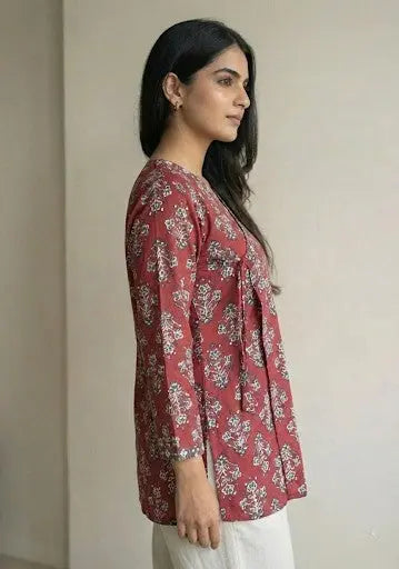Ruhi short kurti with a traditional rust-red floral print and an adjustable wrap-around silhouette – Kalyanja.