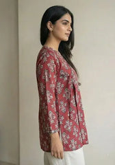 Ruhi short kurti with a traditional rust-red floral print and an adjustable wrap-around silhouette – Kalyanja.
