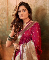 Woman in a traditional saree with a decorative background