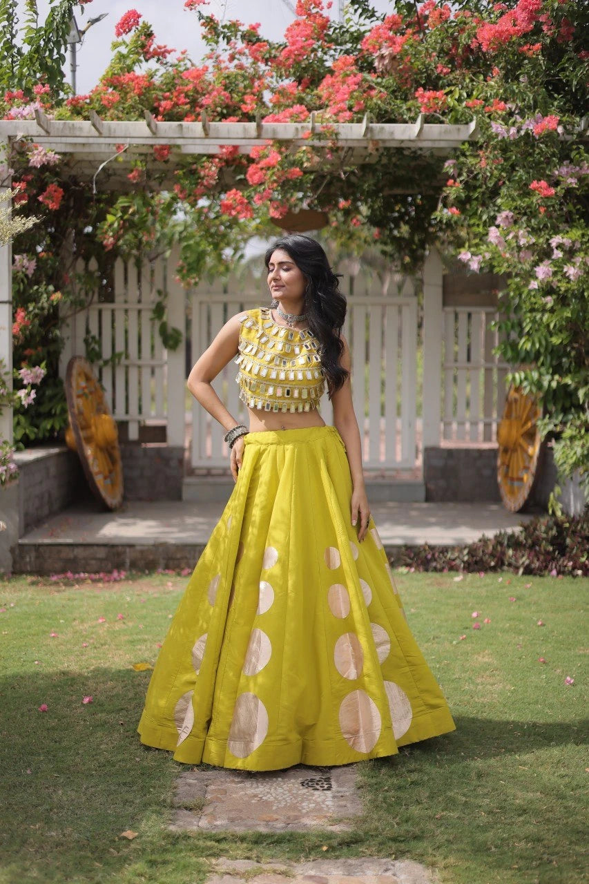 Premium yellow party wear lehenga designed with luxurious detailing and elegant traditional craftsmanship.