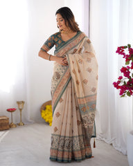 Woman wearing a traditional saree with a white background and decorative elements.