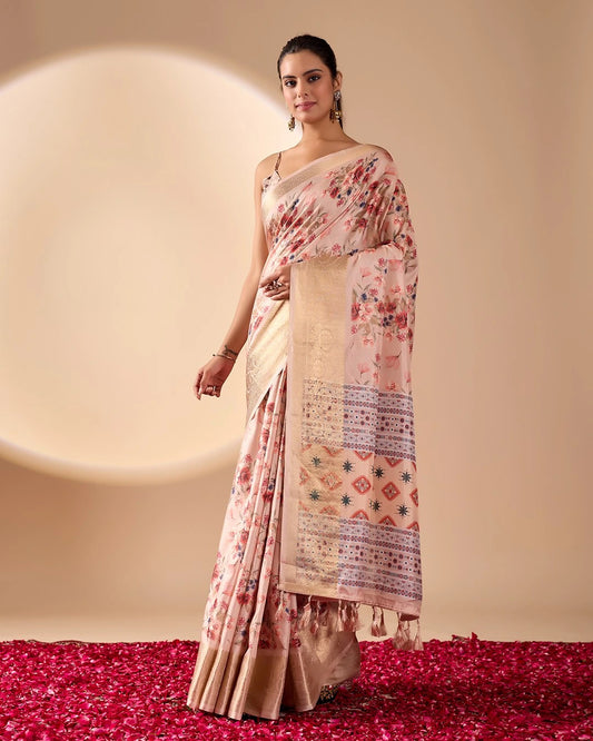 Woman wearing a floral saree with a beige border on a red and beige background