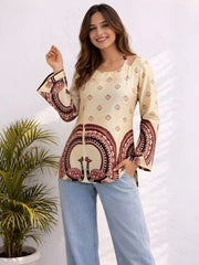 She stands with her hands in her pockets against a clean white background