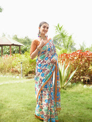 Women's beige floral saree with intricate copper brown woven border and tassel pallu for festive occasions.
