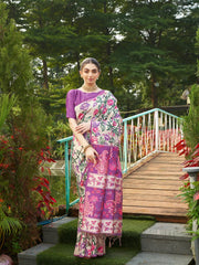 Beautiful purple floral saree featuring woven border and tassel pallu perfect for weddings and festivals.