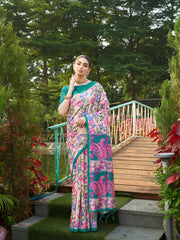 Premium teal green floral printed saree with vibrant woven pallu and graceful traditional look.