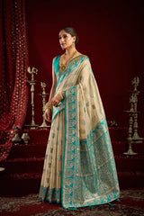 Woman in a traditional saree with a decorative background