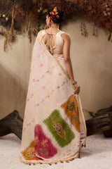 The background has hanging dried flowers and earthy tones, creating a rustic aesthetic.