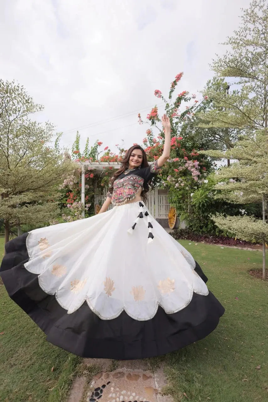 Gorgeous White Ethnic Lehenga with Traditional Embroidered Blouse, Decorative Hemline, and Timeless Indian Fashion