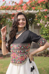 Elegant Black and Ivory White Lehenga Choli with Vibrant Embroidered Bodice, Flared Skirt, and Traditional Festive Appeal