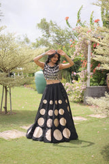 Premium black party wear lehenga designed with luxurious detailing and elegant traditional craftsmanship.