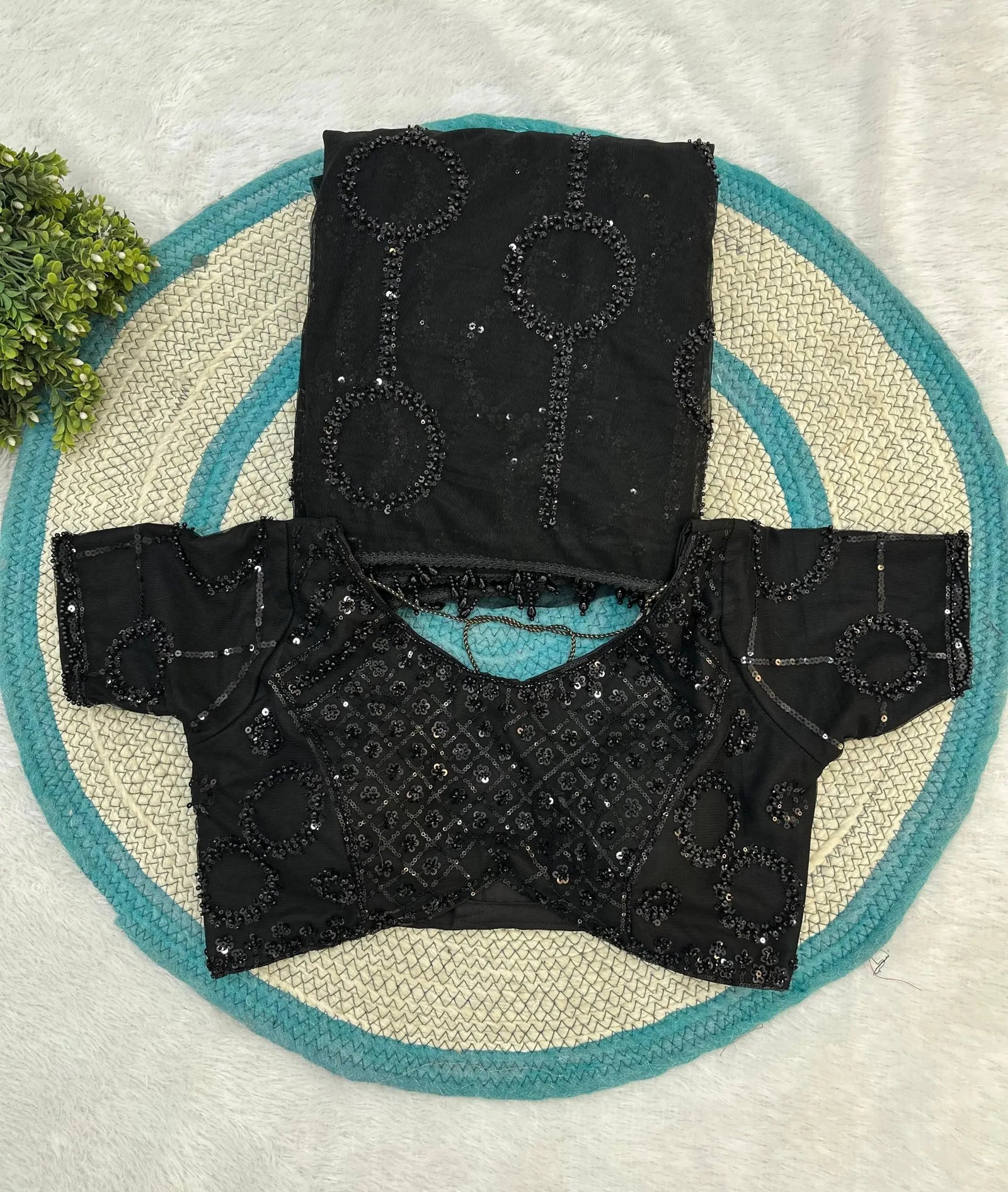 Gorgeous black sequins embroidered saree with matching blouse offers premium quality, refined style, and effortless festive glamour.