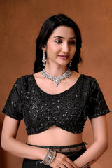 Beautiful Indian embroidered saree with a contemporary silhouette, sparkling embellishments, and sophisticated elegance.