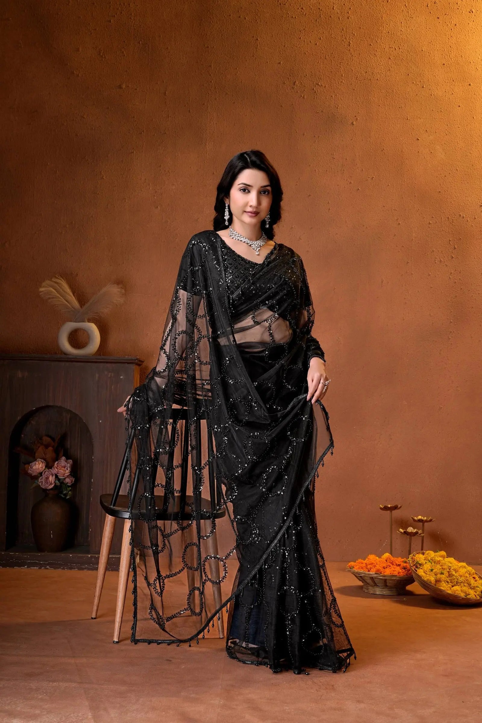 Premium party wear saree with a matching embroidered blouse, sheer embellished pallu, and graceful modern ethnic styling.