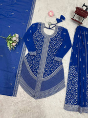 Blue embroidered traditional outfit with matching dupatta on a light gray background
