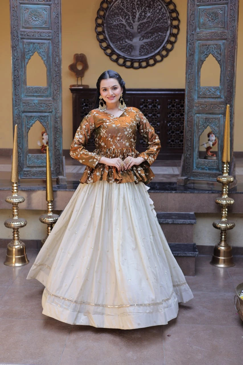 Woman in traditional outfit standing in a decorated room with ornate walls and decor.