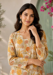 Woman wearing a floral dress with a blurred background