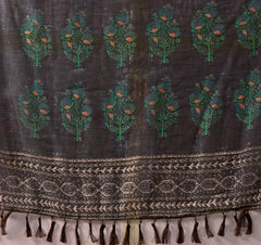 Textile with tree patterns and a decorative border on a white background