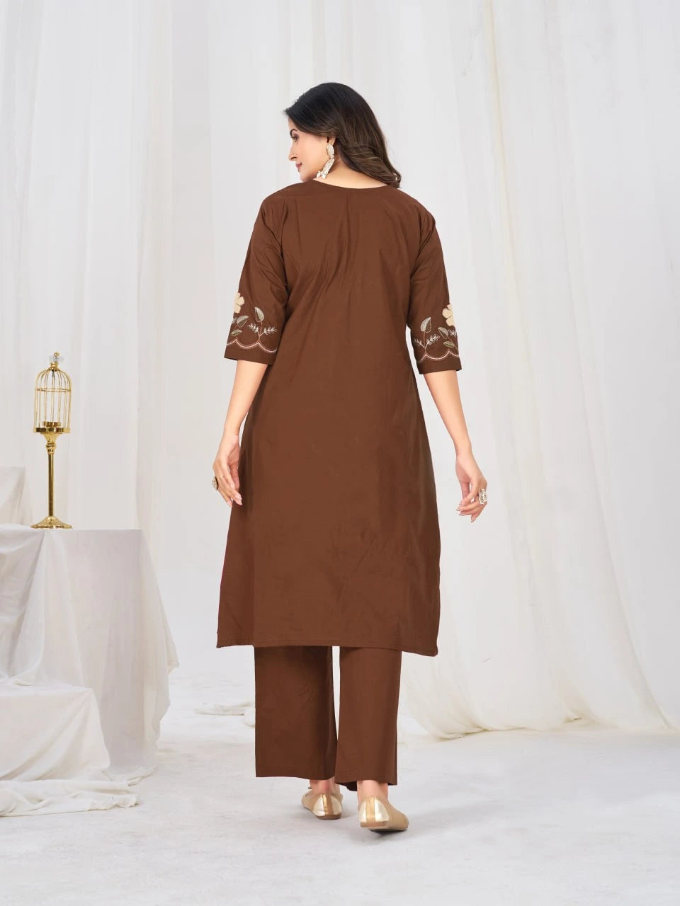 Sophisticated coffee-brown traditional outfit adorned with intricate floral embroidery, perfect for festive gatherings and celebrations.