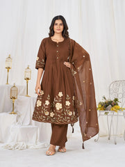 Elegant brown embroidered kurta set featuring floral detailing, matching pants, and a lightweight dupatta for a graceful ethnic look.