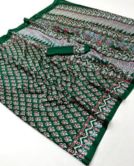 Green fabric with floral pattern on a white background