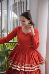 Women's Rust Orange Tiered Lehenga Set with Golden Gota Lace Border and Elegant Traditional Design