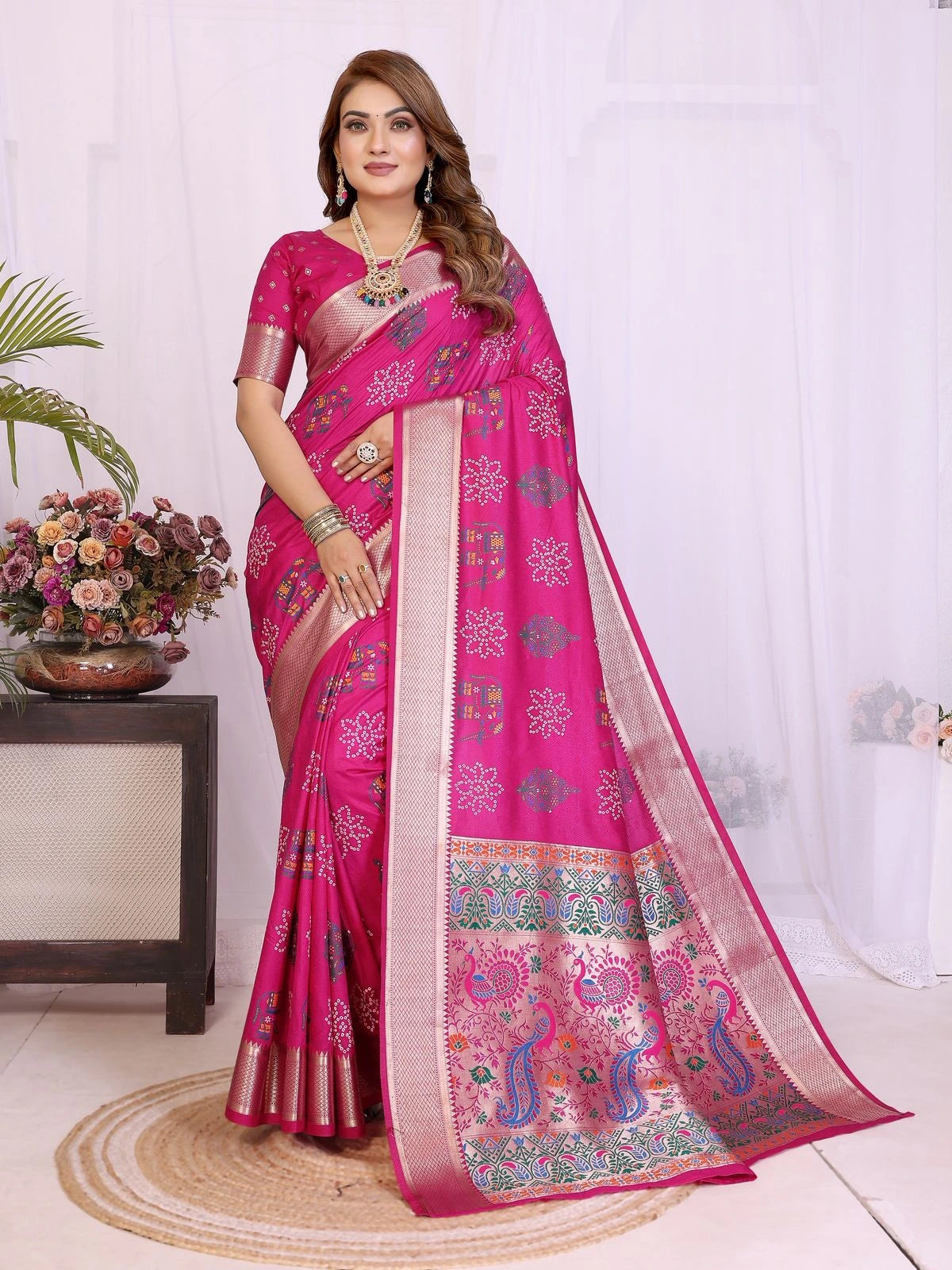 Woman wearing a pink saree with a white background