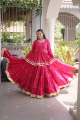 Traditional Pink Lehenga Outfit with Peplum Kurti, Broad Ghera, and Classic Golden Lace Work