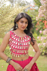 Designer festive lehenga crafted with shimmering mirror embellishments and premium fabric for a vibrant ethnic look.