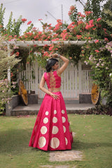 Elegant women's festive outfit enhanced with statement earrings and handcrafted accessories for a complete traditional look.