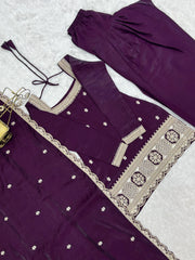 Purple traditional outfit with intricate gold embroidery on a light gray background