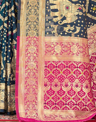 Traditional saree with elephant design and pink border