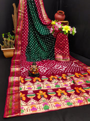 Colorful embroidered fabric with patterns and a small statue on a dark background