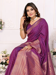 Woman wearing a purple saree with a white background