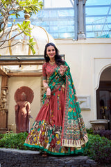 Premium maroon ethnic saree with handcrafted Kalamkari artwork, green floral pallu, and festive elegance.