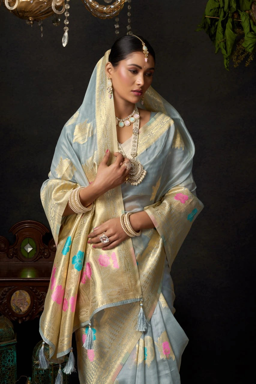 Woman in traditional attire with a dark background