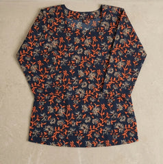 Floral patterned shirt on a beige background