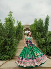 Green Digital Print Lehenga walking on garden path towards pavilion