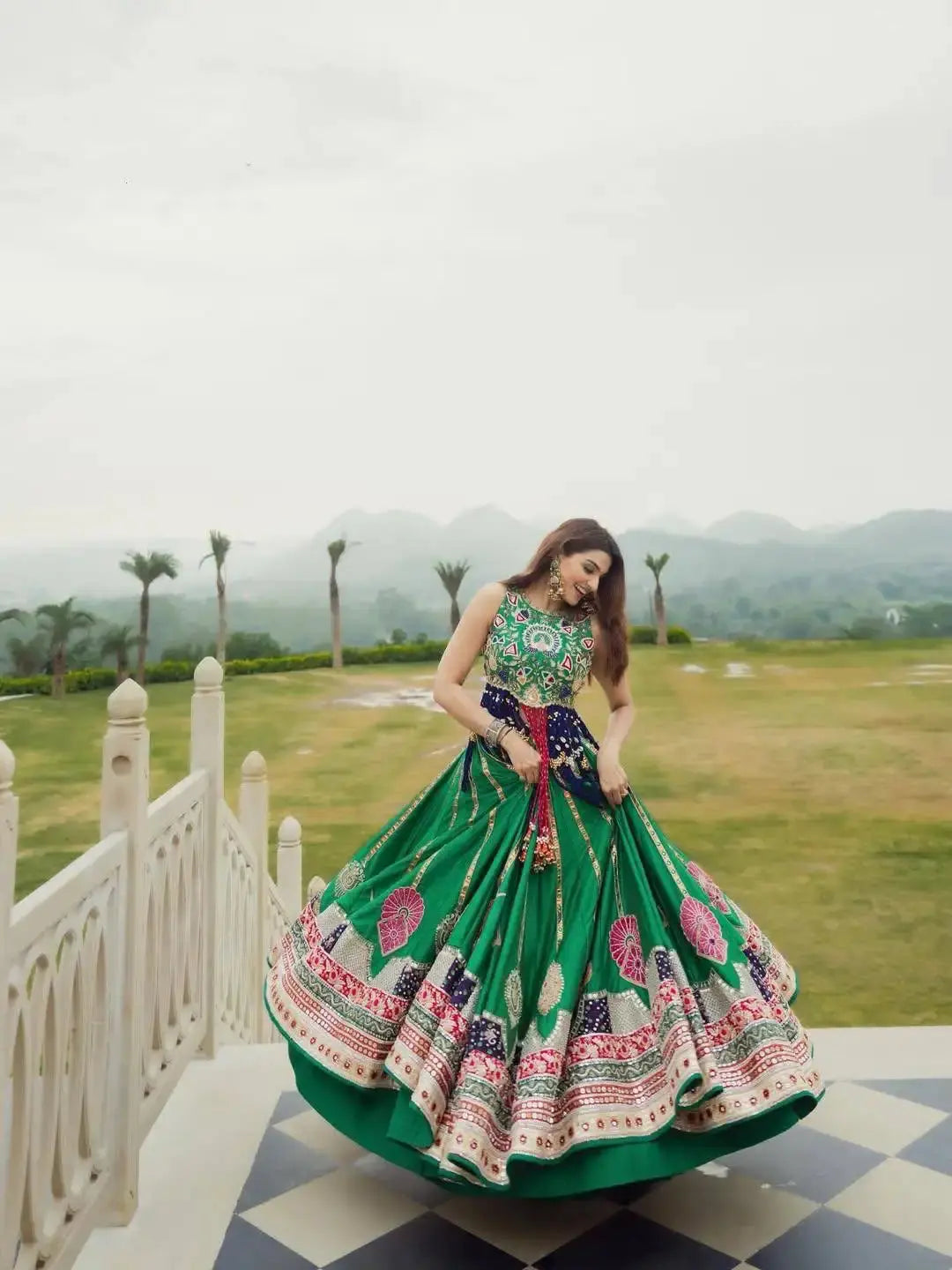 Green Digital Print Lehenga twirl showing embroidered border detail