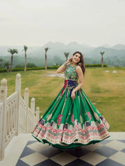 Green Digital Print Lehenga twirl view against garden backdrop