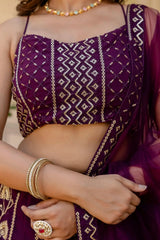 Wine Lehenga choli close-up – geometric diamond sequin pattern, round neck, sleeveless embroidered choli