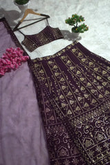 Wine Georgette Lehenga skirt detail flat lay – gold floral vine embroidery and heavy sequin border close-up