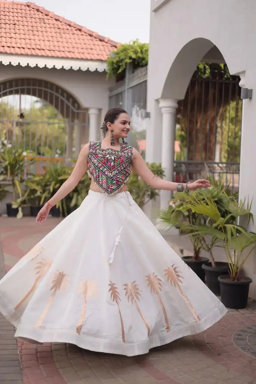 White Gamthi Lehenga arms spread twirl – 6 meter flair showing palm print hem, festive ethnic wear