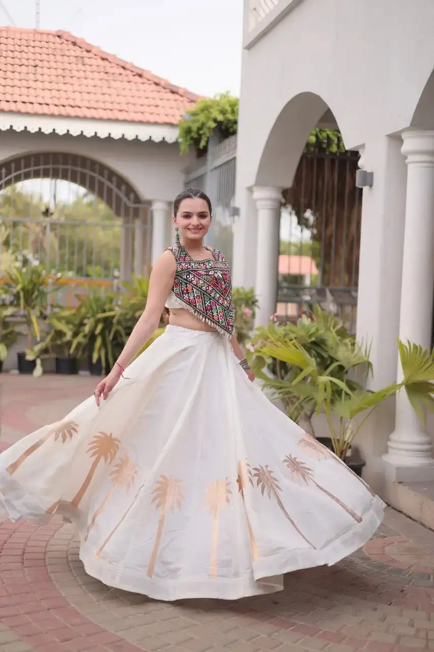 White Gamthi Embroidered Lehenga twirl shot – 6 meter circular flair, copper palm tree print at hem