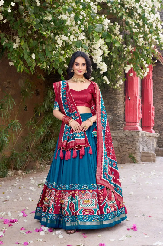 Rama Blue Floral Print Lehenga – Front drape view showing Tussar Silk Blend skirt with patola elephant border and gold foil work