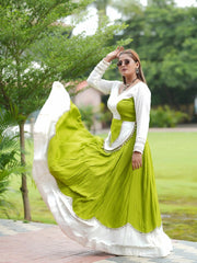 Green Mirror Lace Work Lehenga – Side view showing 6-meter flair and V-neck full sleeve choli with cowrie shell peplum detail