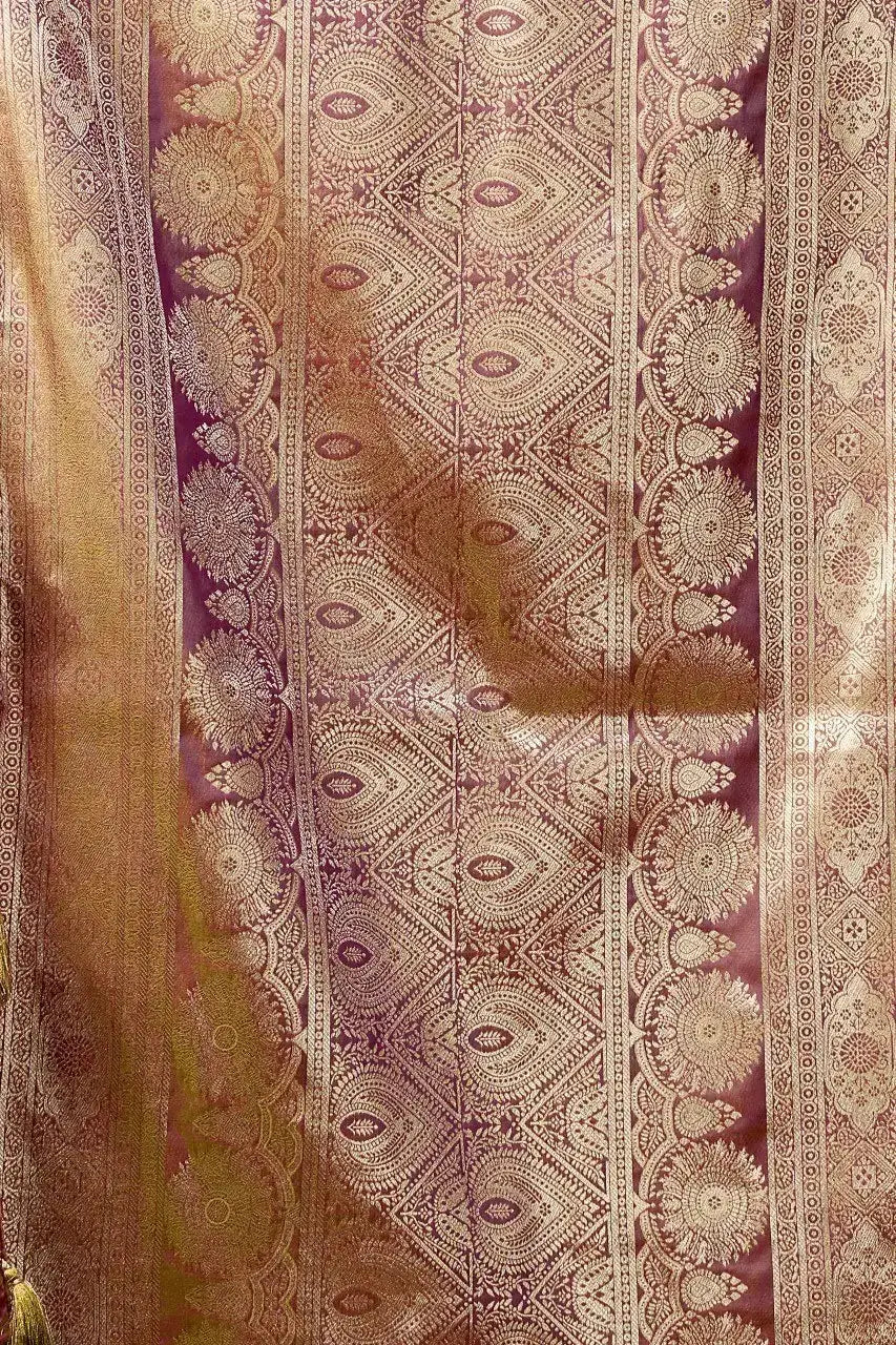 Close-up of Wine Jacquard Weaving Saree pallu — all-over dense gold zari with traditional temple motif weave