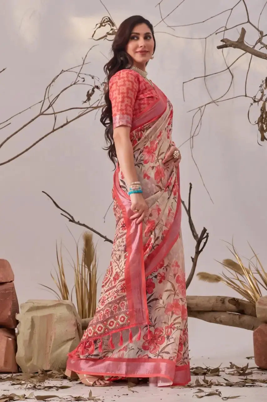 Beige Linen Cotton Saree – side view showing floral body print, coral contrast border and pallu drape