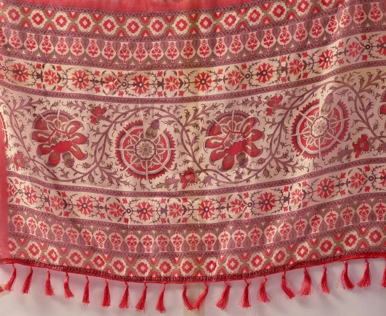 Beige Linen Cotton Saree pallu detail – Kalamkari-style medallion floral motifs, stripe bands and red tassels